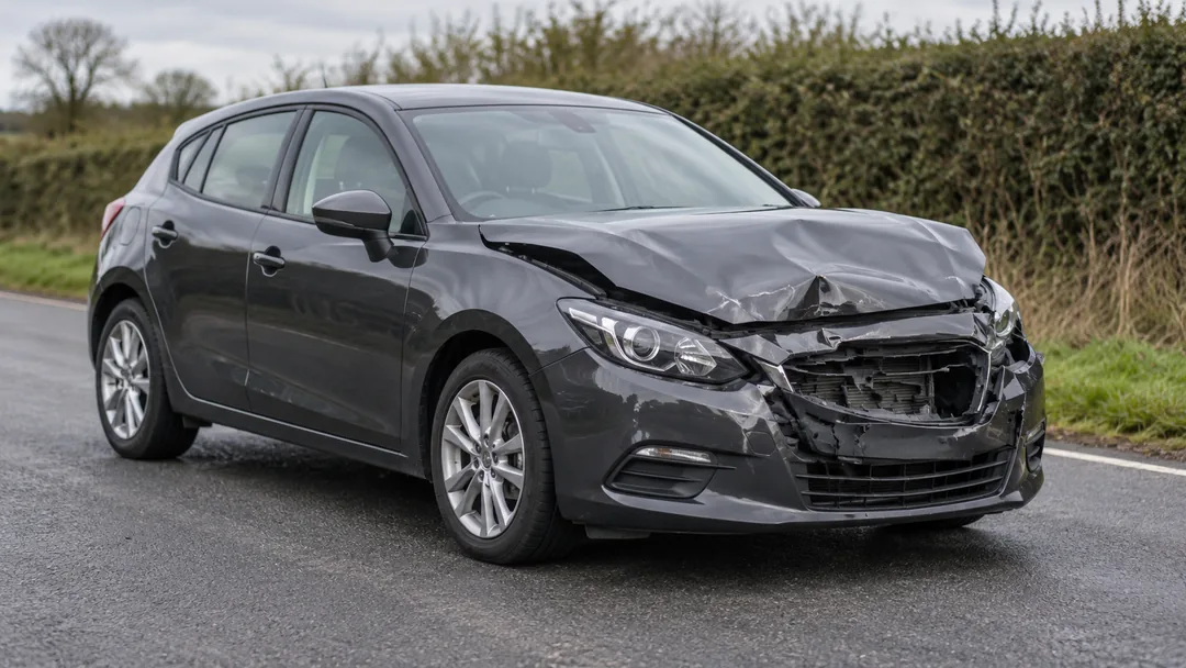 Illustration of one damaged car on the road