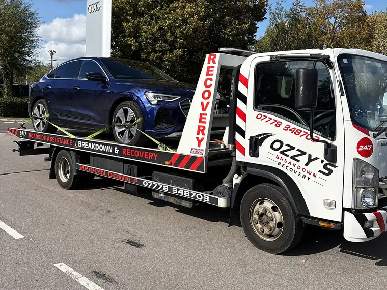 Electric Audi on Ozzy’s Breakdown Recovery flatbed truck