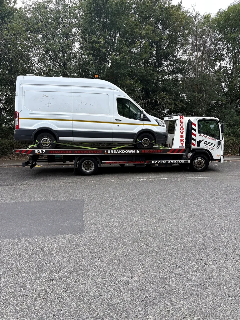 Large van on our flatbed – instant breakdown cover in the M3 by Ozzy’s Breakdown Recovery